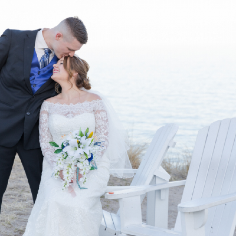 BRIDE AND GROOM ON THE BEACH AT BLUE HARBOR RESORT WEDDING