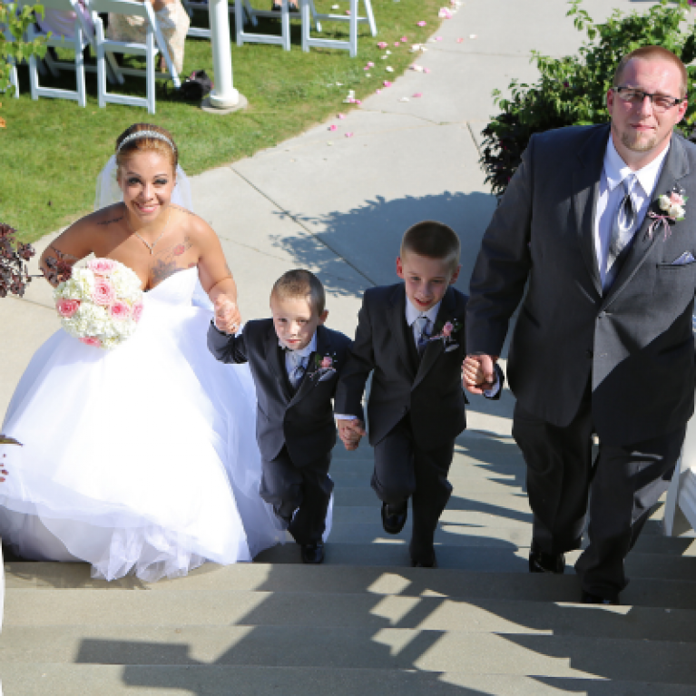 BRIDE AND GROOM RECESSIONAL AT BLUE HARBOR RESORT WEDDING