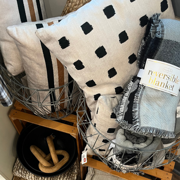 PILLOWS AND BLANKETS AT THE BOUTIQUE