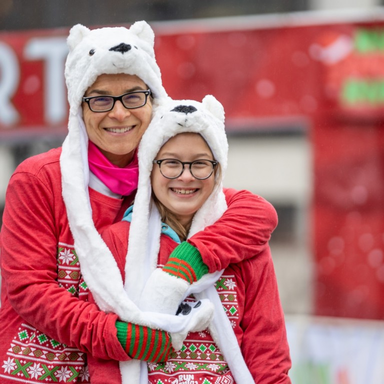 RUNNERS IN COSTUME AT RUN SANTA RUN